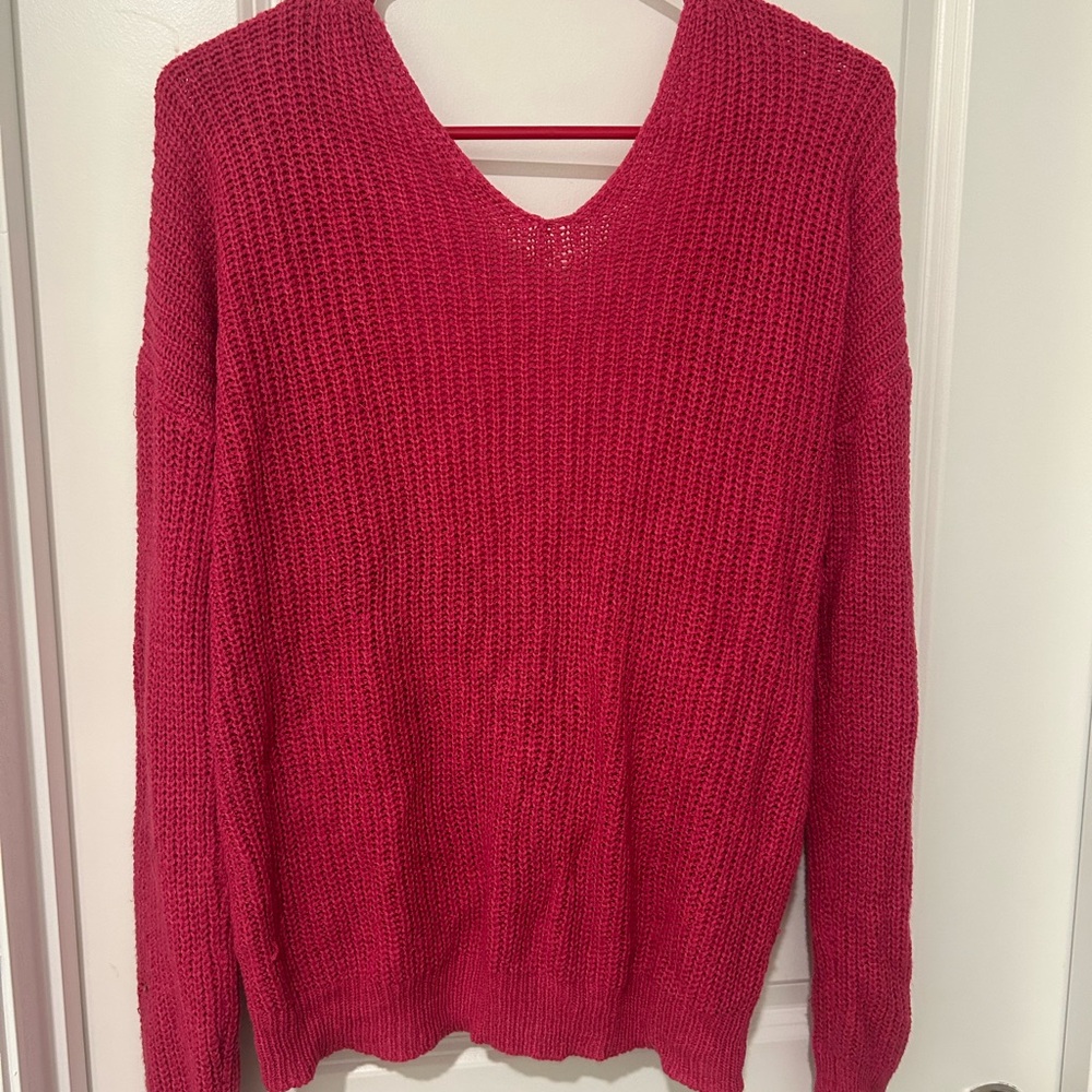 Francesca’s pink open back sweater